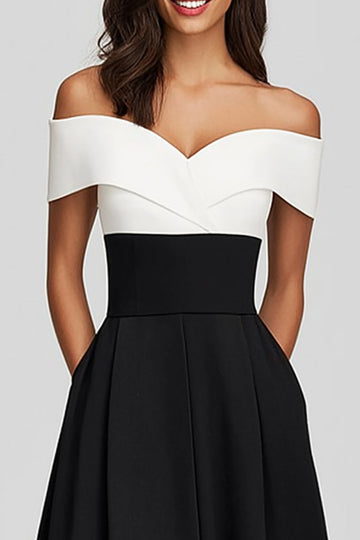 Robe longue formelle en satin noir et blanc à épaules dénudées avec poches